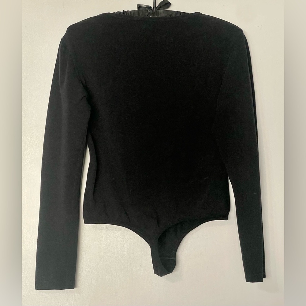 Long Sleeve Thong Bodysuit Black Size XL in good, preowned condition as shown